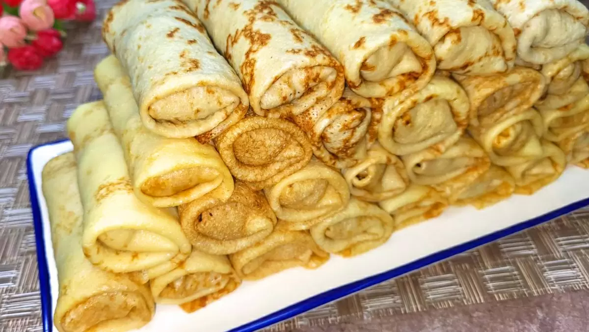 Пробуйте: универсальный рецепт блинов с восхитительной начинкой